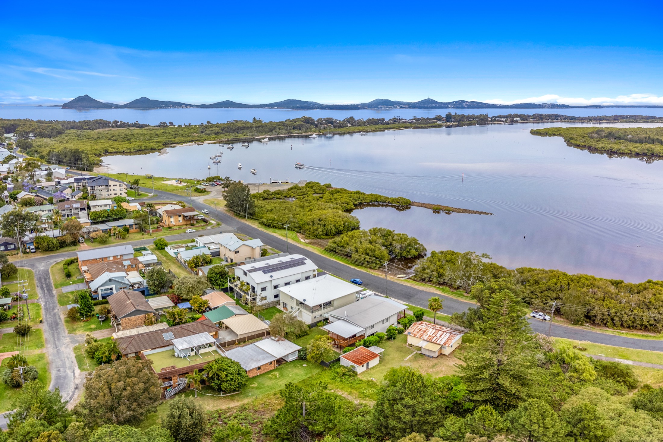 Aerial over Hawks Nest toward Port Stephens